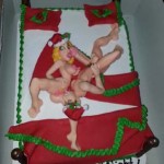 Christmas-sexy-man-and-girl-doll-on-holiday-bed-cake